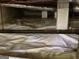 Clean crawl space featuring a vapor barrier and insulated pipes at 1815 Dodson Sw Dr, Atlanta, GA 30311