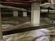 Crawl space with vapor barrier and foundational support pillars at 1815 Dodson Sw Dr, Atlanta, GA 30311