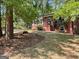 Exterior view of the home featuring a manicured front lawn at 1815 Dodson Sw Dr, Atlanta, GA 30311