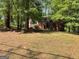 Well-maintained exterior view of the home with mature landscaping at 1815 Dodson Sw Dr, Atlanta, GA 30311