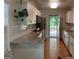 Bright and modern kitchen with granite countertops, a view of the deck and stainless steel appliances at 1815 Dodson Sw Dr, Atlanta, GA 30311