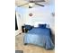 Cozy carpeted bedroom with a blue comforter, and LED lights at 11755 Highway 36, Covington, GA 30014