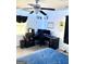 Bedroom features a modern ceiling fan and a great home office space at 11755 Highway 36, Covington, GA 30014