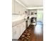 Updated kitchen with stainless steel appliances, granite countertops, and modern cabinetry at 11755 Highway 36, Covington, GA 30014