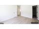 Neutral bedroom with light wood flooring and bright light at 185 Wadley Nw St, Atlanta, GA 30314
