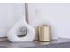 Close up of modern artful decor, featuring white sculptures with gold accent at 185 Wadley Nw St, Atlanta, GA 30314