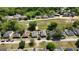 Aerial view of the neighborhood showcasing a variety of homes and lush greenery at 30 Poplar St, Porterdale, GA 30014