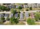 Aerial shot of the neighborhood featuring tree lined streets and well-maintained properties at 30 Poplar St, Porterdale, GA 30014