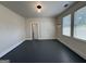 Spacious bedroom with wood floors, two closets, and bright natural light at 30 Poplar St, Porterdale, GA 30014
