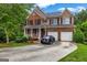 Beautiful two-story house with a two-car garage and a well-maintained front yard at 803 Baugh Springs Ln, Lawrenceville, GA 30044