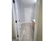 Bathroom featuring gray floors, a wood vanity, and a white door at 64 Shadow Ct, Palmetto, GA 30268