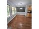 Charming breakfast area with large windows and custom chalkboard wall at 64 Shadow Ct, Palmetto, GA 30268