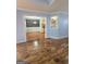 Open living space with views into a dining area and kitchen at 64 Shadow Ct, Palmetto, GA 30268