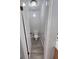 Small water closet featuring a toilet with gray walls at 64 Shadow Ct, Palmetto, GA 30268