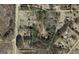 Aerial view of property and surrounding landscape with boundary lines highlighted at 2450 Highway 155 N, Mcdonough, GA 30252