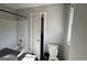 Standard bathroom with toilet, shower/tub, and a simple vanity at 2450 Highway 155 N, Mcdonough, GA 30252
