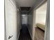 Hallway leading to rooms and featuring hardwood flooring at 2450 Highway 155 N, Mcdonough, GA 30252