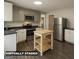 Well-appointed kitchen with stainless steel appliances and functional center island at 2450 Highway 155 N, Mcdonough, GA 30252