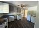 Picture of the kitchen which includes cabinets and black countertop at 2450 Highway 155 N, Mcdonough, GA 30252