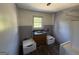Bright laundry room with a sink, utility hookups, and a window at 2450 Highway 155 N, Mcdonough, GA 30252