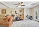 Finished basement offering an exercise area, neutral carpet, and recreational space at 319 Corrigan Trce, Peachtree City, GA 30269