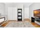 Clean bedroom with modern furnishings, a TV, and a spacious closet at 319 Corrigan Trce, Peachtree City, GA 30269