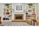 Close-up of fireplace and built-in shelves with decorative accents at 319 Corrigan Trce, Peachtree City, GA 30269