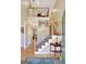 Grand foyer featuring hardwood floors, a staircase with wrought iron railings, and elegant decor at 319 Corrigan Trce, Peachtree City, GA 30269