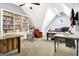 Spacious home office with multiple desks, bookshelves, and an exercise bike at 319 Corrigan Trce, Peachtree City, GA 30269