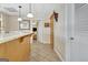 Bright kitchen offers a pantry and tiled flooring with a view into the bedroom at 319 Corrigan Trce, Peachtree City, GA 30269
