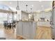 Bright kitchen with an island, stainless appliances, and hardwood floors at 319 Corrigan Trce, Peachtree City, GA 30269