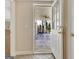 Open doorway leads to an outdoor patio with a spiral staircase and flagstone flooring at 319 Corrigan Trce, Peachtree City, GA 30269