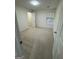 Cozy bedroom with neutral carpet, a window for natural light, and a convenient closet for storage at 435 Cedarhurst Rd, Lawrenceville, GA 30045