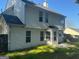 The back exterior features vinyl siding, a gray roof, and a patio area at 435 Cedarhurst Rd, Lawrenceville, GA 30045