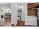 Hallway leading to laundry room with updated appliances at 226 Le Paradis Blvd, Sharpsburg, GA 30277