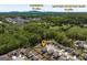 Community aerial view highlighting the neighborhood's location near Cumming and Sawnee Mountain Park at 7435 Ansley Park Way, Cumming, GA 30028