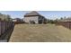 Large, private fenced-in backyard offers plenty of space for outdoor activities and relaxation at 7435 Ansley Park Way, Cumming, GA 30028