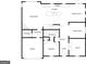 First floor plan featuring the living room, kitchen, mud room, garage, bedroom, and office at 7435 Ansley Park Way, Cumming, GA 30028