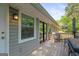 Back deck with siding on the house and chair with grill at 1256 Horsley Mill Rd, Carrollton, GA 30116