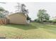 The spacious backyard features a wood fence around the perimeter of the property at 15 Pine Run Rd, Carrollton, GA 30116