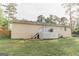 A spacious backyard boasts a deck with stairs, ideal for outdoor entertaining and relaxation at 15 Pine Run Rd, Carrollton, GA 30116