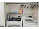 This laundry room has storage and front loading machines at 15 Pine Run Rd, Carrollton, GA 30116