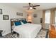 The main bedroom features decorative wall hangings and curtains at 15 Pine Run Rd, Carrollton, GA 30116