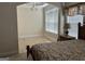 Spacious bedroom featuring a sitting area with tile floors and plenty of natural light at 30 Scouts Ridge Dr, Covington, GA 30016