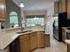 Cozy kitchen featuring stainless steel appliances and a breakfast bar at 30 Scouts Ridge Dr, Covington, GA 30016