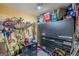The garage is well-organized with storage solutions, and the walls are painted in a bright, cheerful yellow at 146 Highland Cir, Mcdonough, GA 30253