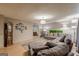Spacious living room with a large sectional sofa, decorative rug, and stylish accents for a cozy feel at 146 Highland Cir, Mcdonough, GA 30253