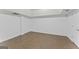 Finished basement area with tile flooring and neutral wall color, ready for customization at 462 Chase Marion Way, Mcdonough, GA 30253