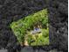 An aerial view of the property and surrounding lush, wooded acreage at 50 Ridgeview Dr, Jonesboro, GA 30236