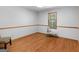 Bright and airy bedroom with hardwood floors and neutral paint at 50 Ridgeview Dr, Jonesboro, GA 30236